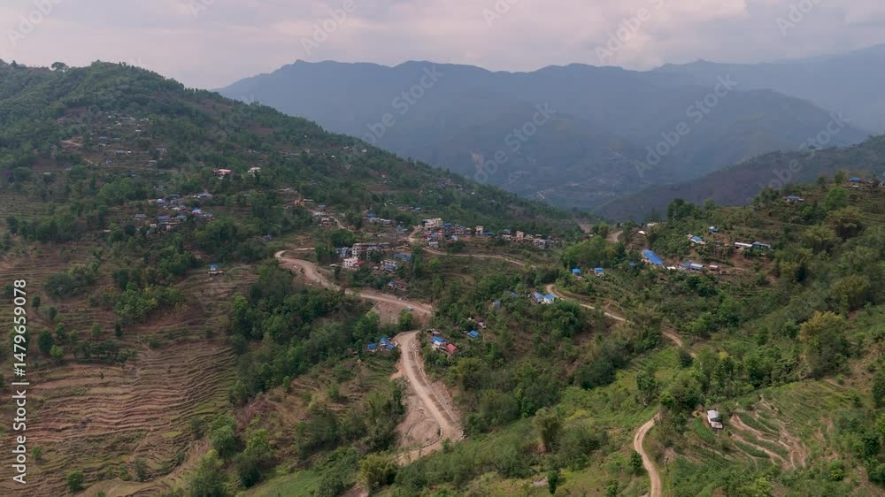 mountain landscape in the mountains. Aerial view of rural area of Nepal. village with green nature. Rural Village surrounded by hills. Aerial view of a construction site on a highway in a rural area mountain landscape in the mountains. Aerial view of rural area of Nepal. village with green nature. Rural Village surrounded by hills. Aerial view of a construction site on a highway in a rural area
