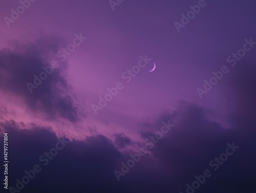 Crescent moon shining brightly in the night sky with dark clouds and stars above in a dreamy purple tone