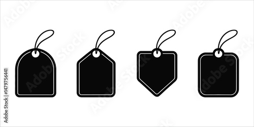 Four Black Price Tags with Strings Ideal for Retail Branding Design
