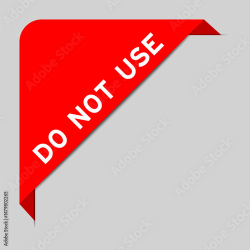 Red color of corner label banner with word do not use on gray background