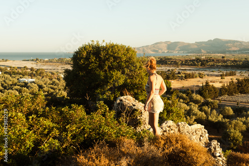 Young woman admiring breath...