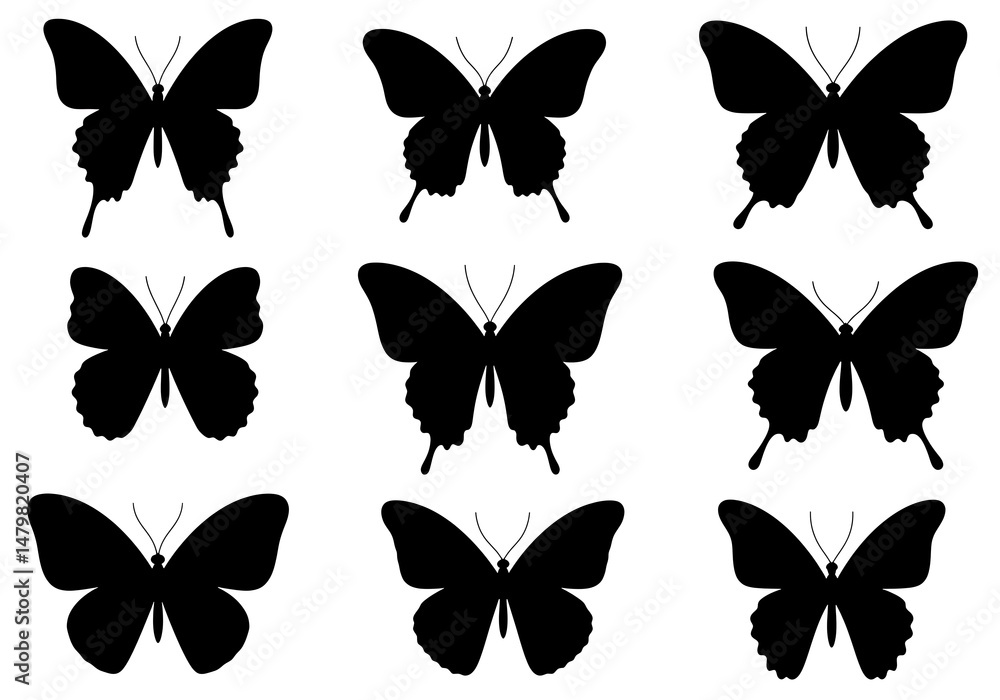 Fototapeta premium Elegant Black Butterfly Silhouettes: A Graphic Collection