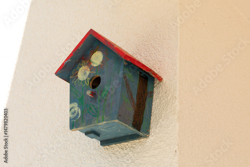 Charming birdhouse with a h...