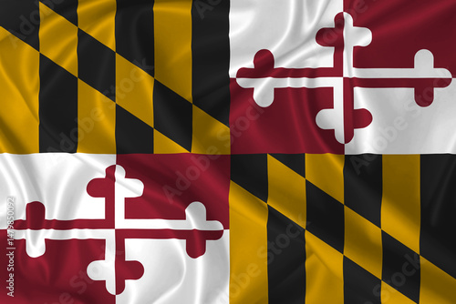 Flag of Maryland State waving in the wind on silk texture