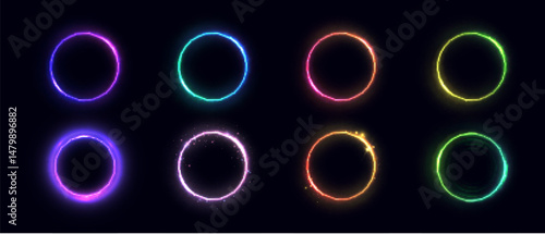 Set of vector glowing rings in neon colors on dark background. Elements for interfaces, game visual effects, frames and decorative graphics.