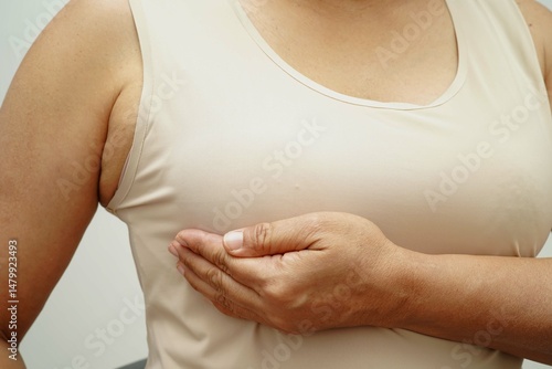 Wallpaper Mural Asian woman self touching check lump or Breast cancer, Breast Self Exam. Torontodigital.ca