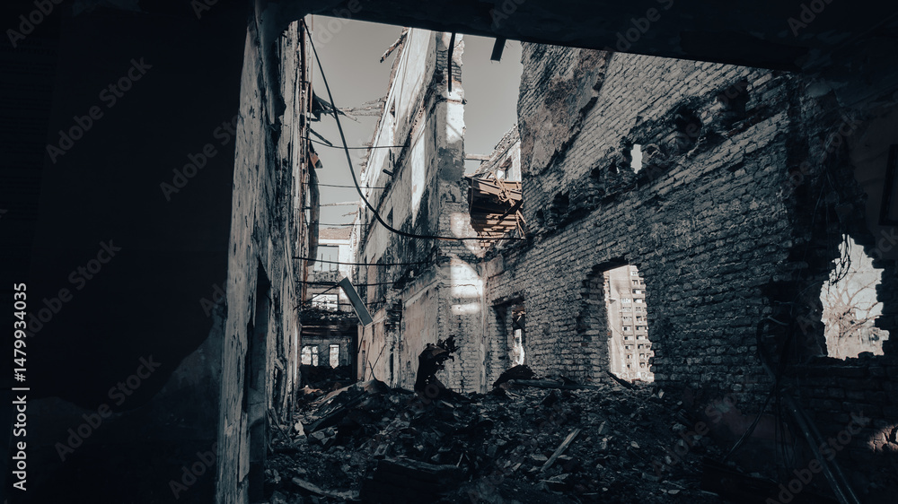 Fototapeta premium ruined street and destroyed houses the city war in Ukraine