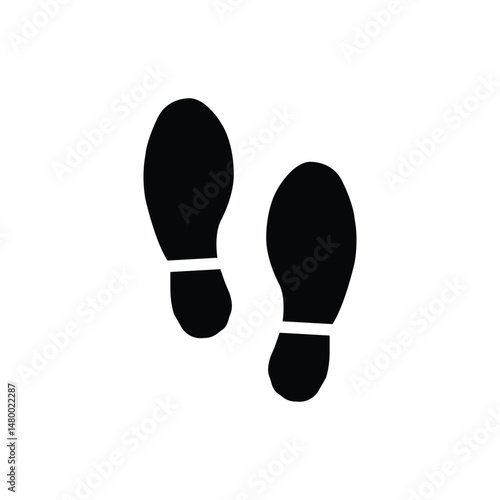 Simple black shoe print icon on a white background, ideal for signage, navigation, safety instructions, pedestrian symbols, or minimalist design projects.