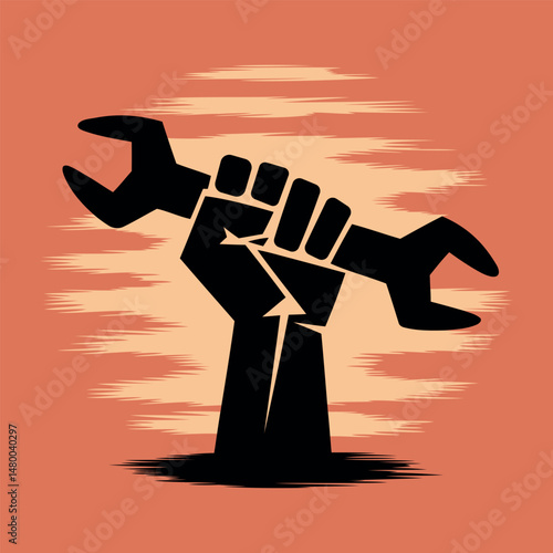 A modern Raised fist holding wrench in silhouette against stylized sunset background.