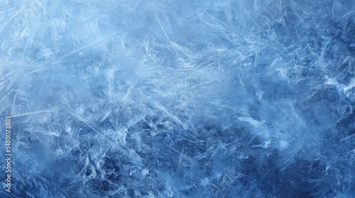 A 4K photo of ice texture background. The textured cold frosty surface of ice block on blue background.
