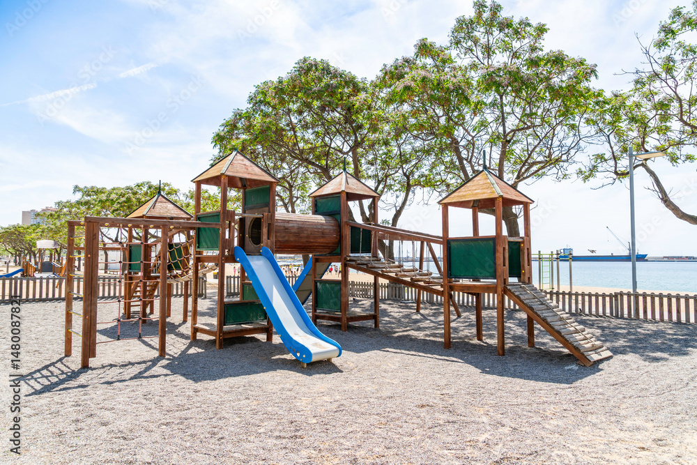 Children playground stands on beach of calonge, catalunya, spain Children playground stands on beach of calonge, catalunya, spain