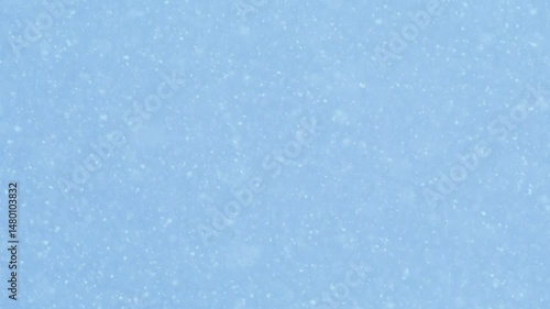 Snow falling in holiday season macro and slow motion.