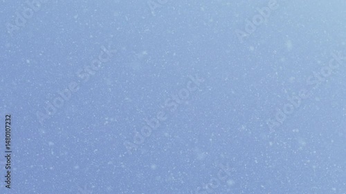Snow falling in holiday season macro and slow motion.