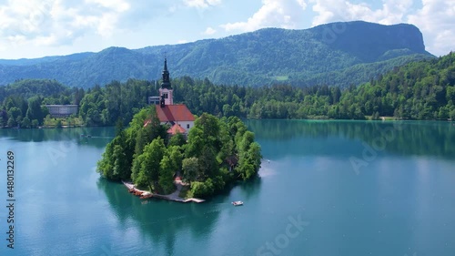 Wallpaper Mural Aerial view of Church of the Assumption of Mary in the center of the lake Bled. Flying around small island on Bled Lake in Slovenia, warm summer day sun Torontodigital.ca