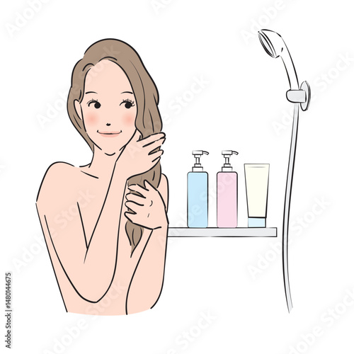 丁寧にヘアケアをするロングヘアの女性