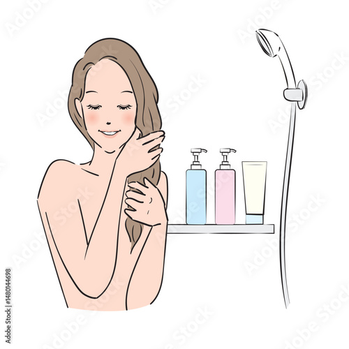 丁寧にヘアケアをするロングヘアの女性