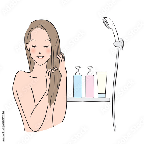 丁寧にヘアケアをするロングヘアの女性