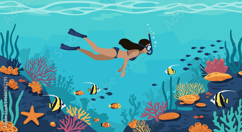 Young woman snorkeling underwater among colorful fish and corals  
