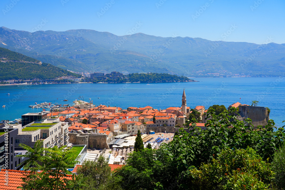 Obraz premium Aerial view of Budva Old Town, a famous resort town on the Montenegrin Riviera along the coast of the Adriatic Sea