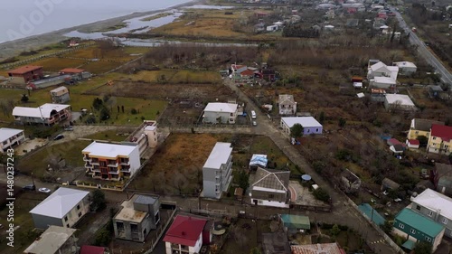 Beautiful Aerial View of Landscape in Adjara, Georgia Showcasing Rivers, Fields, and Vibrant Settlements