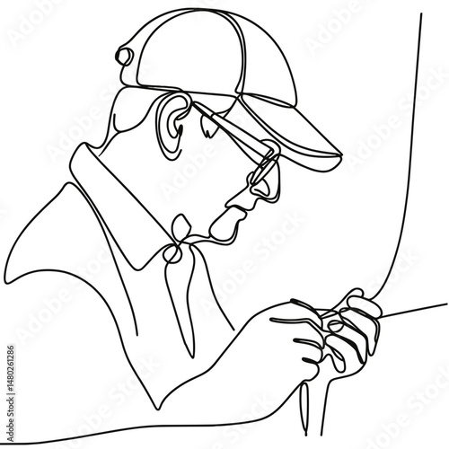 Elderly electrician working with wires while wearing a cap