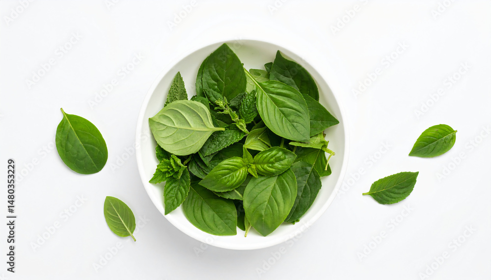 Fototapeta premium white bowl containing herbal leaves