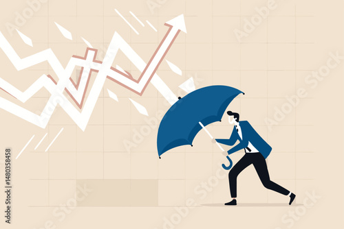 Protection or defensive stock in economy crisis or market crash, business resilient to survive difficulty or insurance concept, businessman holding umbrella to cover and protect from downturn arrow.