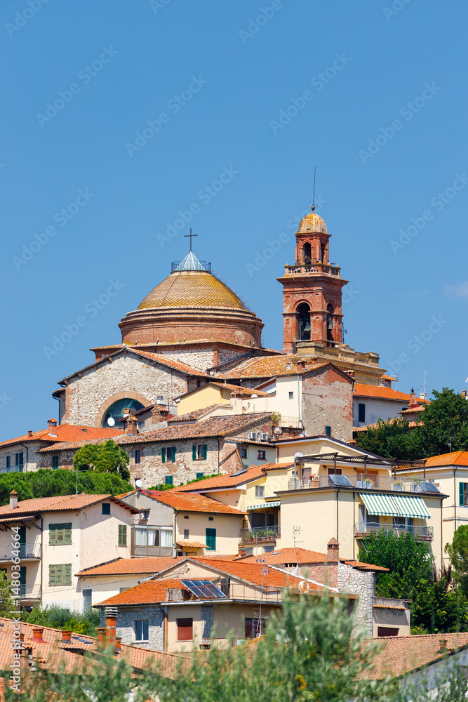 Fototapeta premium Madonna del Soccorso Church dominating the skyline of Castiglione del Lago, Italy