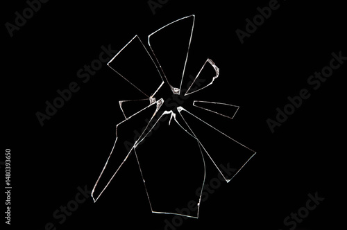broken glass shards isolated on black background