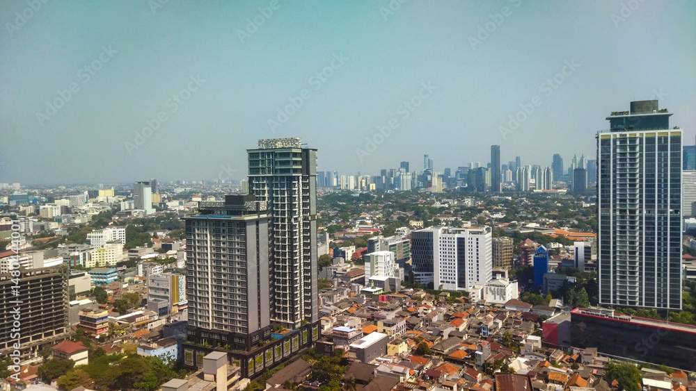 Fototapeta premium Modern Skyscrapers and Dense Urban Housing in Developing Country Cityscape