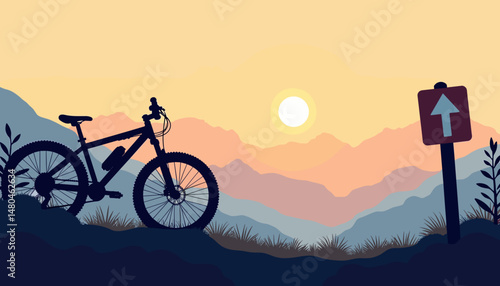 Mountain bike silhouette against sunset mountains and direction sign  