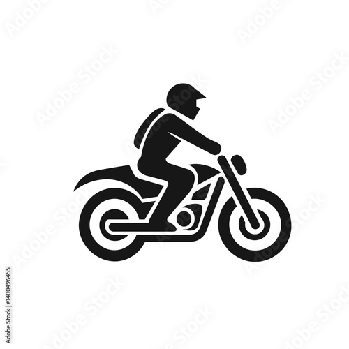 Silhouette of a Motorcycle Rider in Action