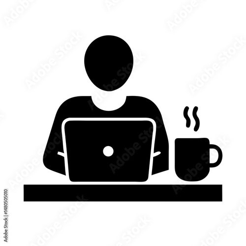 Silhouette of Individual Working at a Laptop with Coffee on the Desk