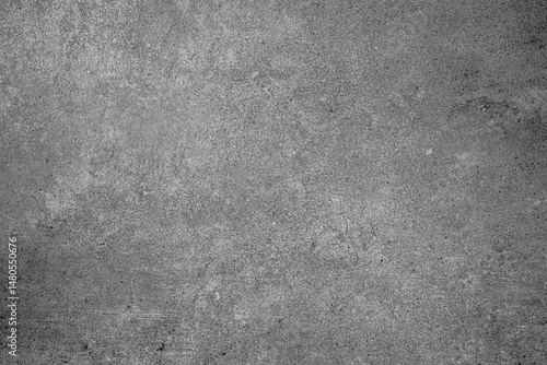 Gray concrete wall texture with natural surface imperfections and subtle cracks
