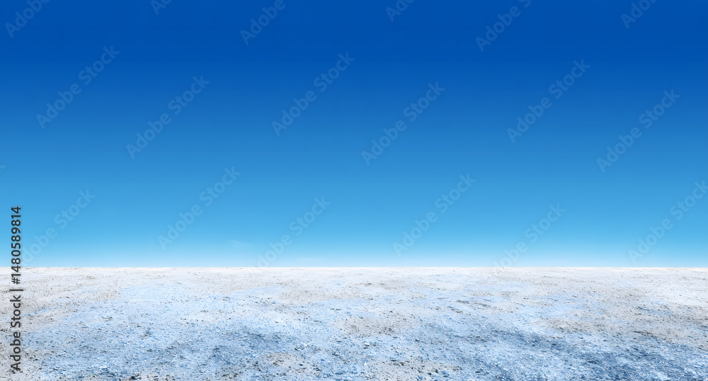 Vast barren landscape under a bright blue sky with minimal clouds during midday sunlight Vast barren landscape under a bright blue sky with minimal clouds during midday sunlight