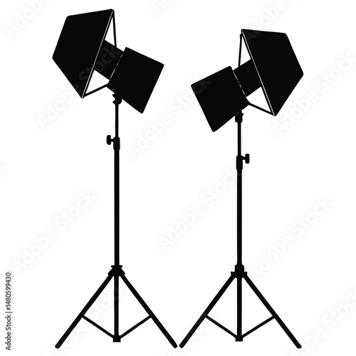 Isolated on white, a studio flash light with equipment like a stand and softbox illuminates photography