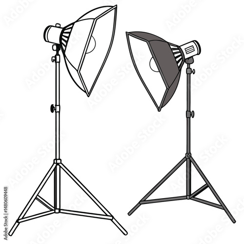 A professional photography studio equipment setup features an isolated white studio flash light on a metal stand