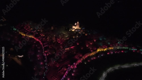 Incredible colorful light show at Tsarevets Fortress, Veliko Tarnovo, Bulgaria, filmed with a drone, aerial view