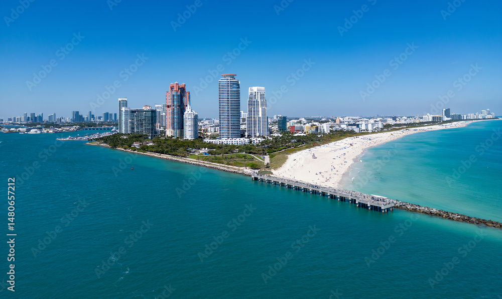Obraz premium Miami Beach skyline aerial view. Miami city from drone. Tropical Miami scene. Miami district sky view. Famous oceanfront. Panoramic coastline. South beach panorama view. Summer travel in Florida.