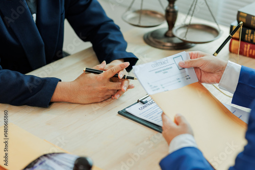 A client submits legal documents to an attorney, providing detailed case information for review and preparation of legal representation.