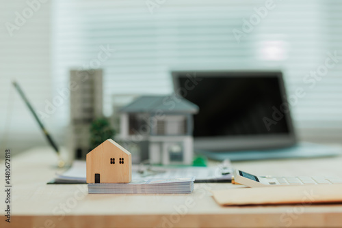A real estate agent presents a model home to a client, offering it as one of the options to help them make an informed purchasing decision.