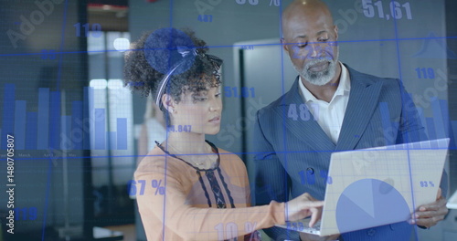 Tableau sur toile Image of financial data processing over diverse business people in office