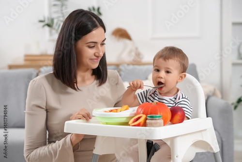 Happy mother with bowl of t...