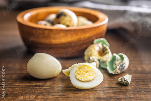 Obraz na płótnie Boiled quail eggs on wooden table. w salonie