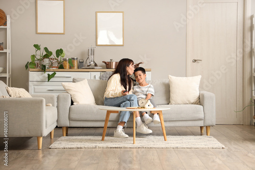 Young mother and her little...
