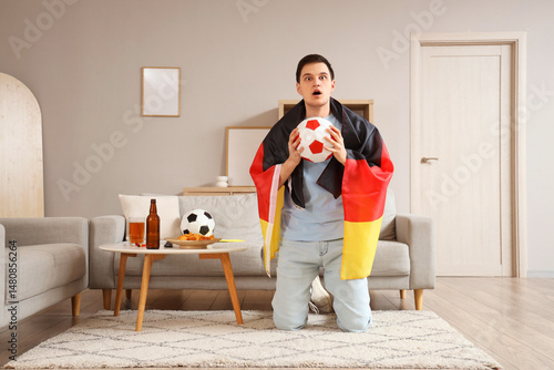 Male sports fan with German...