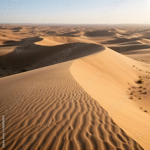 Majestic Desert Dunes A Panoramic View of Rolling Sands Under a Clear Sky