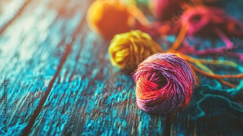 Vibrant yarn balls on rustic wooden surface colorful threads and texture for craft projects
