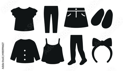 Solid style icons of girls’ clothing basics: ruffle tee, leggings, denim skirt, ballet flats, knit cardigan, flowy top, tights, bow hairband.