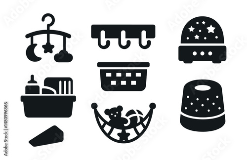 Solid style icons of nursery accessories: crib mobile, wall hooks, storage basket, night projector, diaper caddy, toy hammock, door stopper, sound machine.